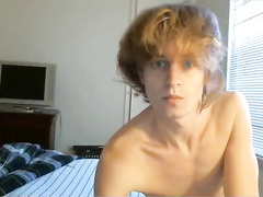 Fit and curly redhead boy exposing his nude body